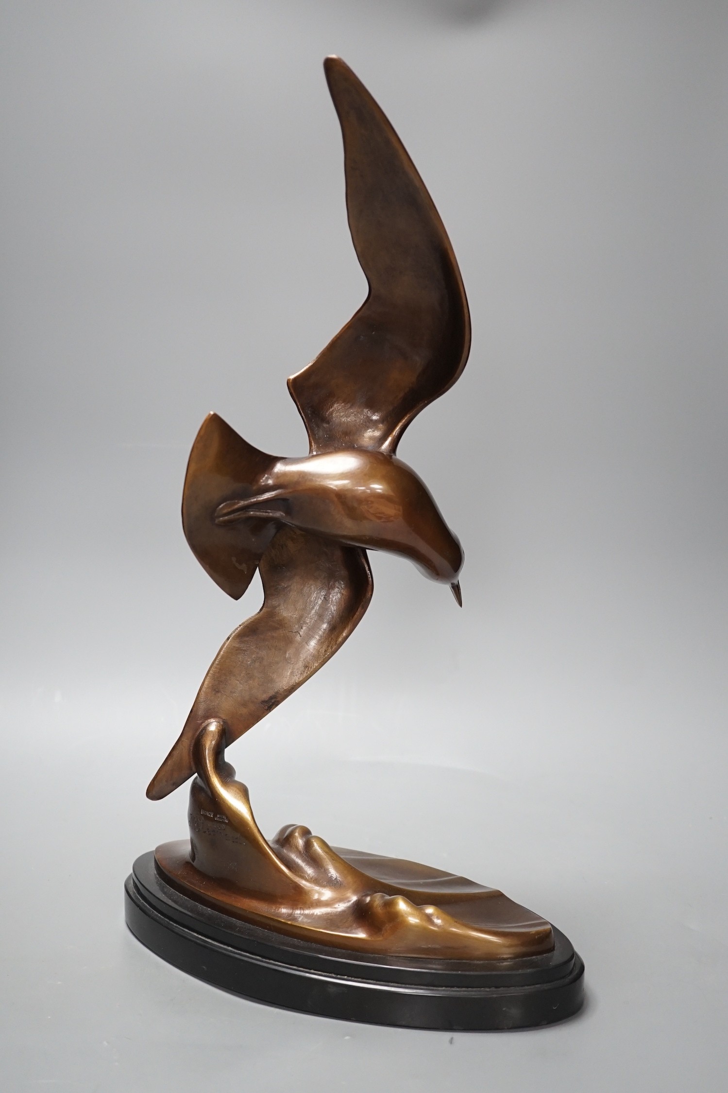 An Art Deco patinated bronze figure of a seabird, signed J B Leonard, 47 cms high
